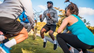 Group of people jumping as part of workout