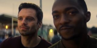Anthony Mackie and Sebastian Stan as Sam Wilson and Bucky Barnes looking on in The Falcon and the Winter Soldier