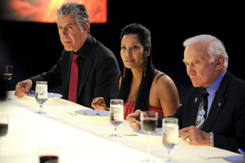 Anthony Bourdain, Padma Lakshmi and Buzz Aldrin dining during the &quot;Space Food&quot; episode of Top Chef.