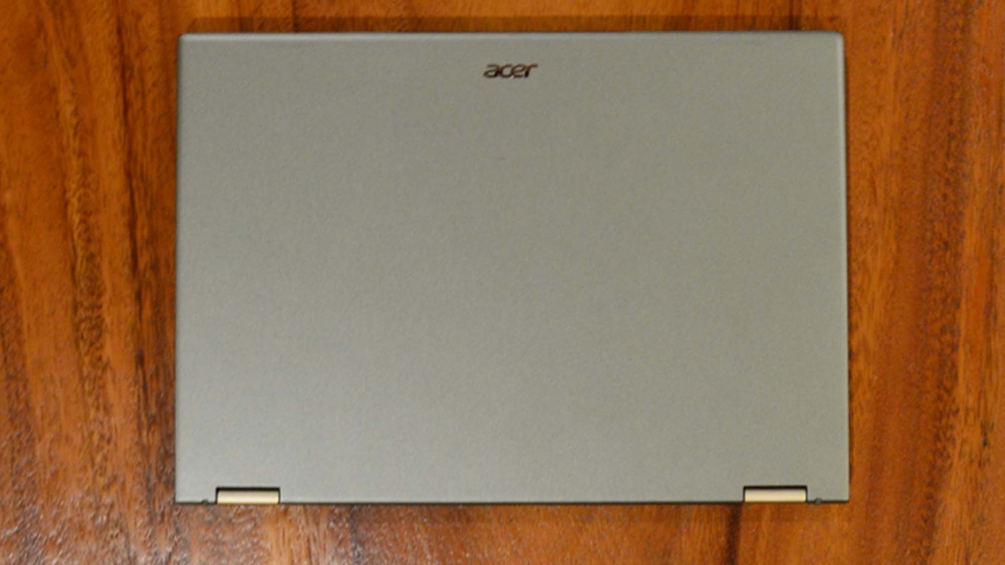 An Acer Spin 5 (2022) on a wood grain table