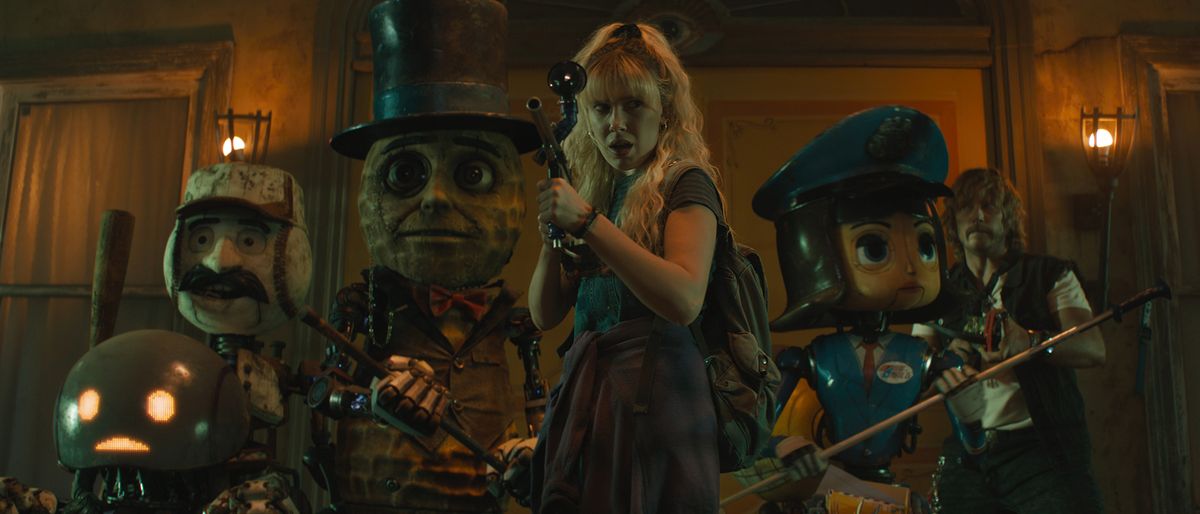 Michelle and her robot allies making a last stand in The Electric State on Netflix