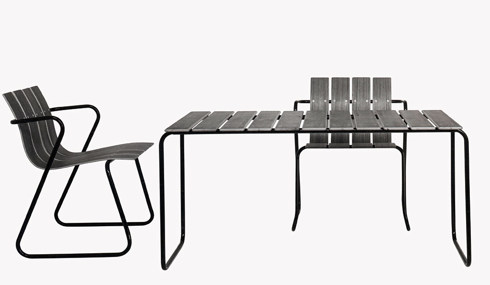 Slatted table and two chairs made from recycled ocean-waste plastic