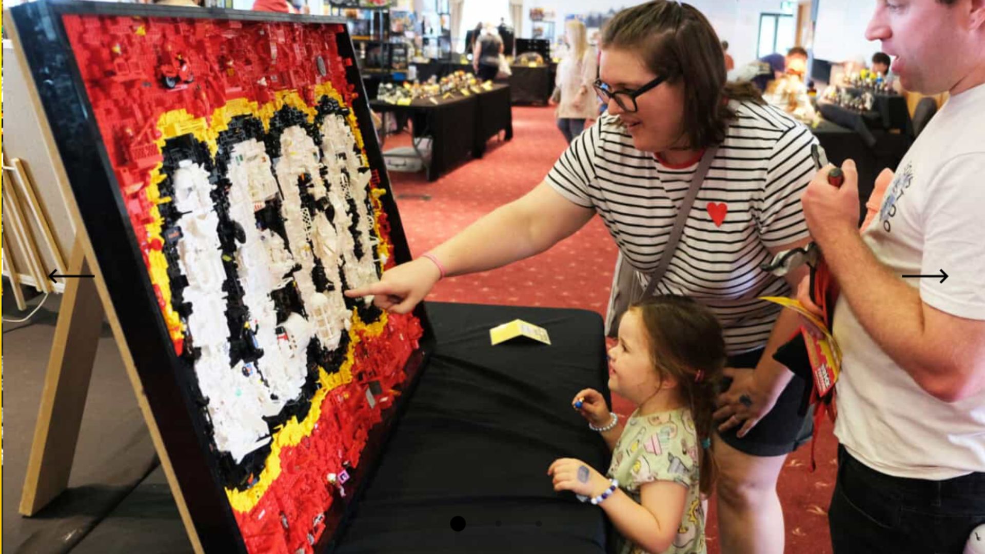 an image of a family looking at one of the LEGO displays at the Brick Festival
