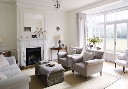 living room with grey furniture and white walls