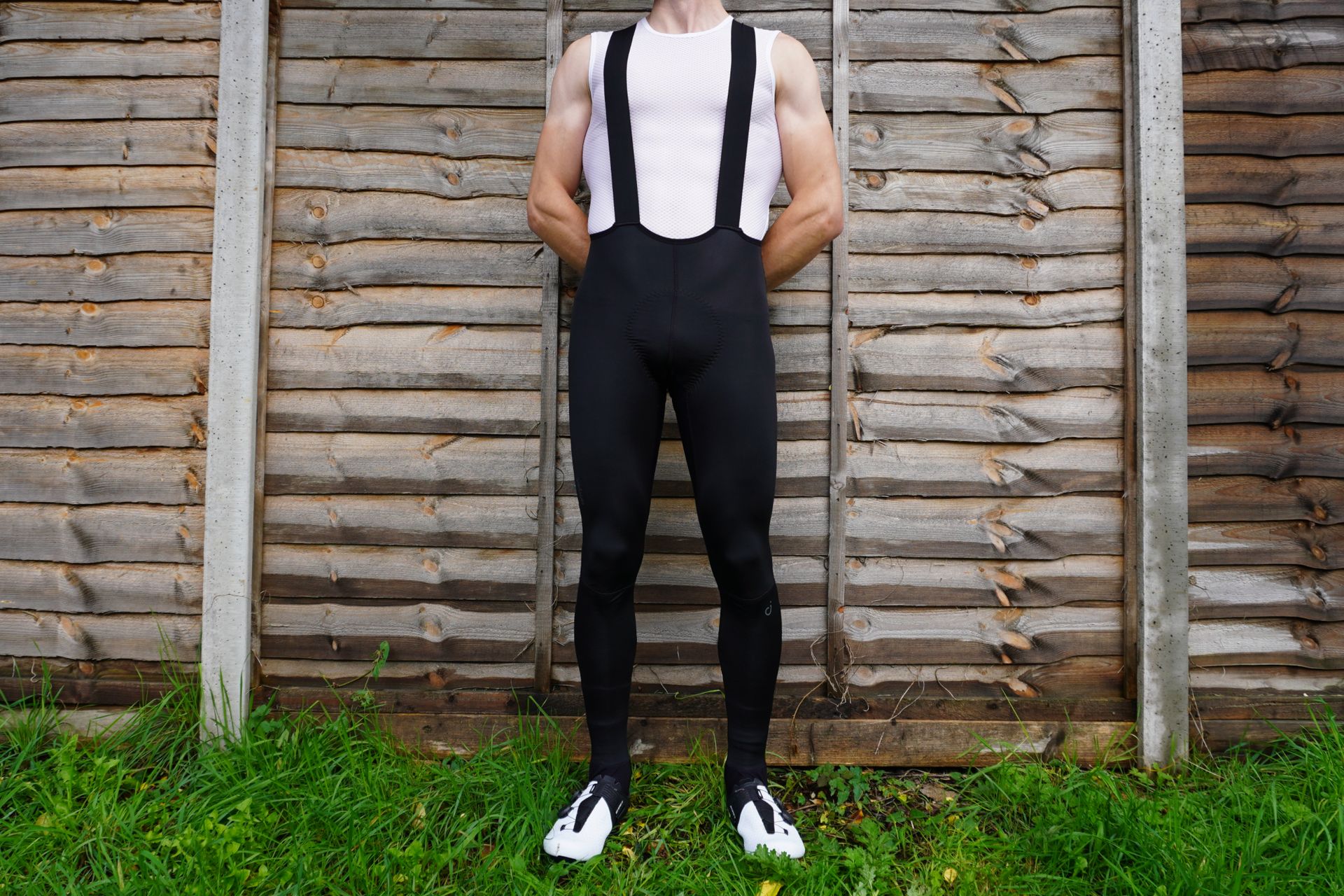 Image shows a rider wearing the Velocio Zero mens bib tights.