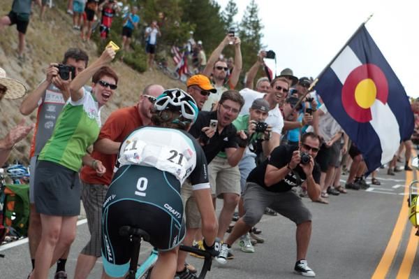 Andy Schleck (Leopard Trek) gets engulfed by fans.