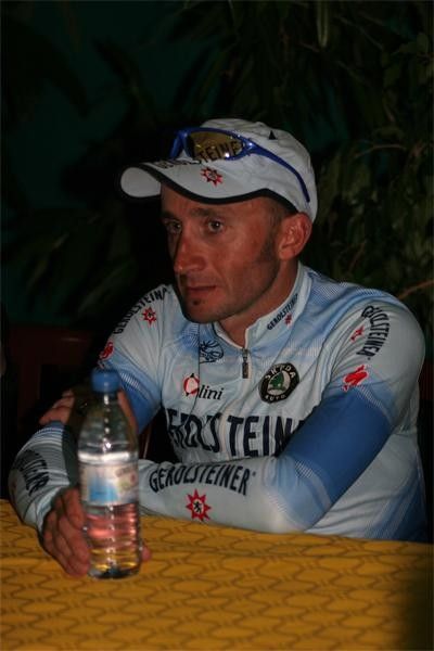 The Italian at the post-race press conference. The water is, of course, by Gerolsteiner.