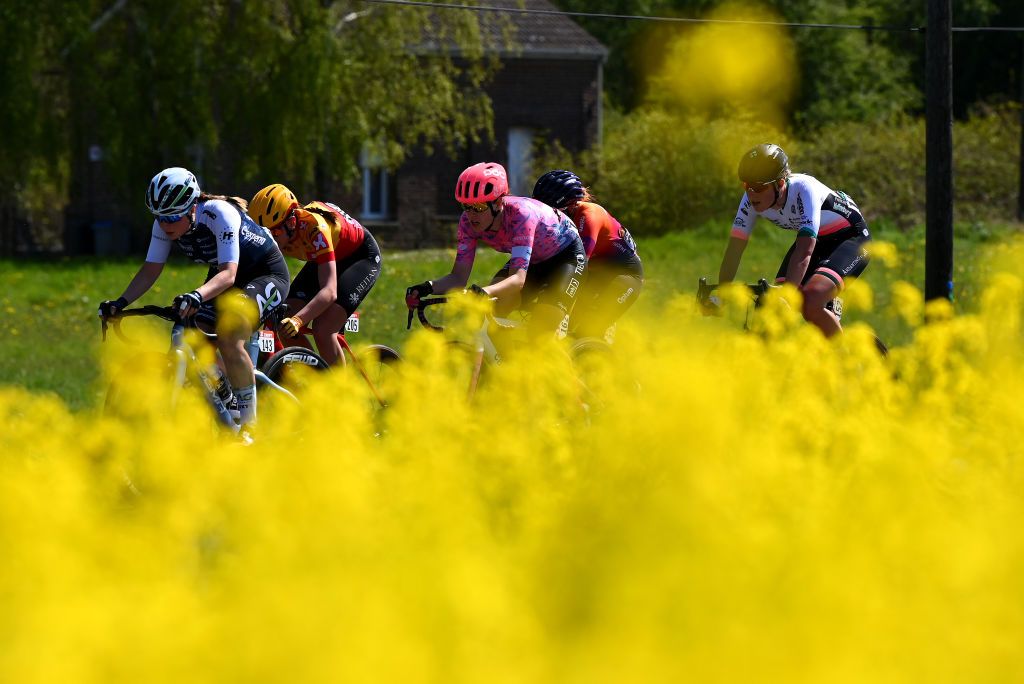 ROUBAIX FRANCE APRIL 16 LR Gaia Masetti of Italy and Team Ag Insurance Nxtg Amalie Lutro of Norway and UnoX Women Cycling Team Tanja Erath of Germany and Team EF Education Tibco Svb Katie Clouse of United States and Team Human Powered Health and Leonie Bos of Netherlands and Team Parkhotel Valkenburg compete in the breakaway through flowery landscape during the 2nd ParisRoubaix 2022 Womens Elite a 1247km one day race from Denain to Roubaix ParisRoubaixFemmes ParisRoubaix on April 16 2022 in Roubaix France Photo by Tim de WaeleGetty Images