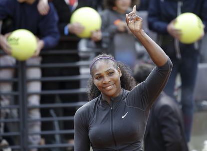 Serena Williams waves to the crowd