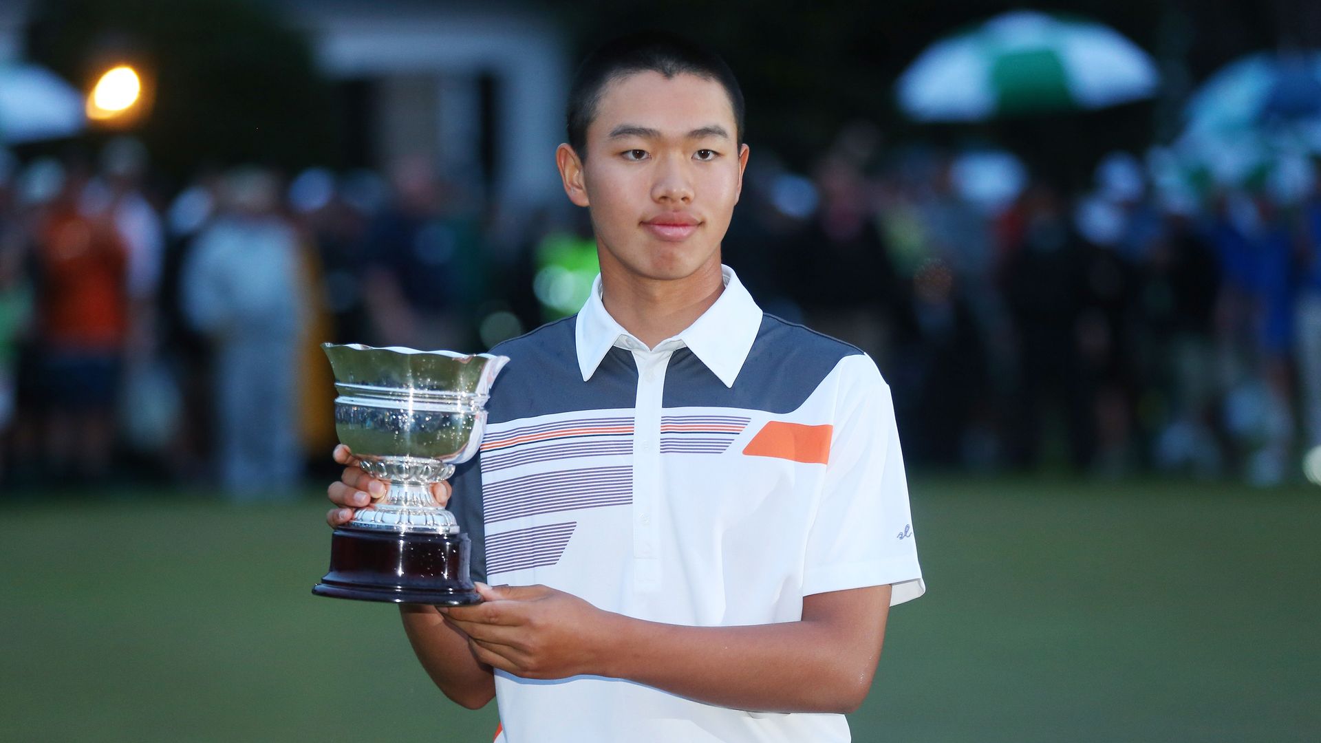 Guan Tianlang at the 2013 Masters after winning the prize for low amateur