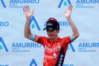 AMURRIO SPAIN APRIL 06 Pello Bilbao Lpez De Armentia of Spain and Team Bahrain Victorious celebrates at podium as stage winner during the 61st Itzulia Basque Country 2022 Stage 3 a 1817km stage from Llodio to Amurrio itzulia WorldTour on April 06 2022 in Amurrio Spain Photo by Gonzalo Arroyo MorenoGetty Images