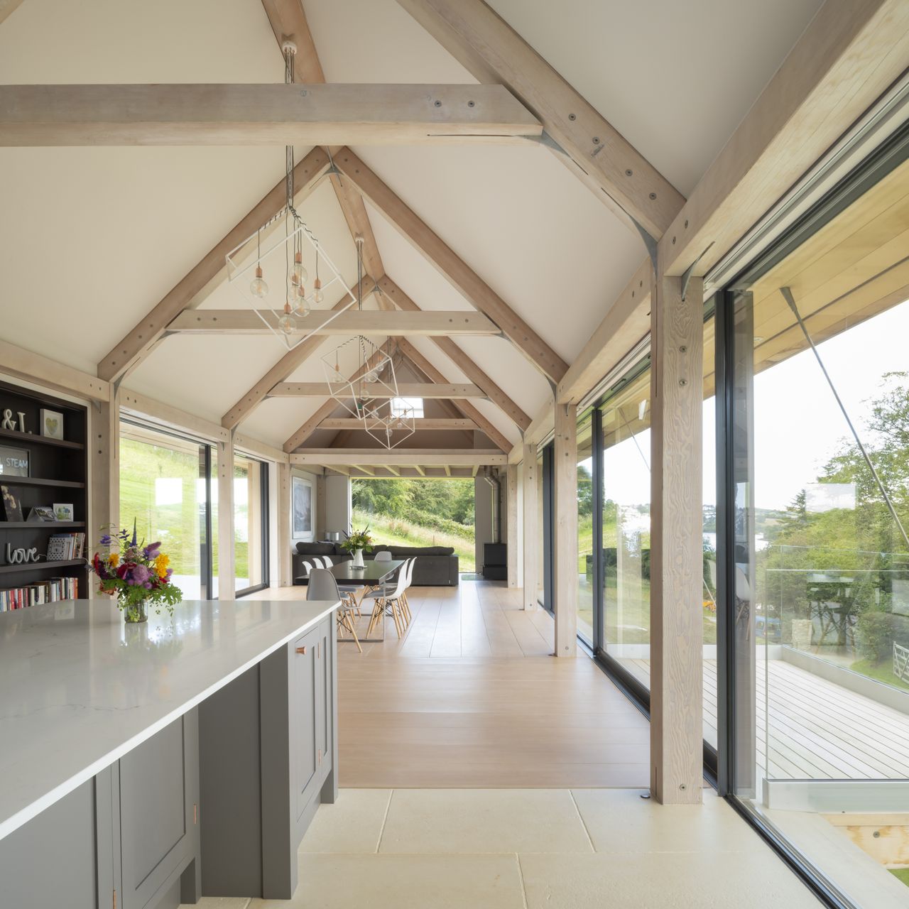 The sliding doors can be pulled back on both sides of the open-plan space &ndash; one to the balcony and the other to the patio area &ndash; for a thoroughly indoor-outdoor experience.