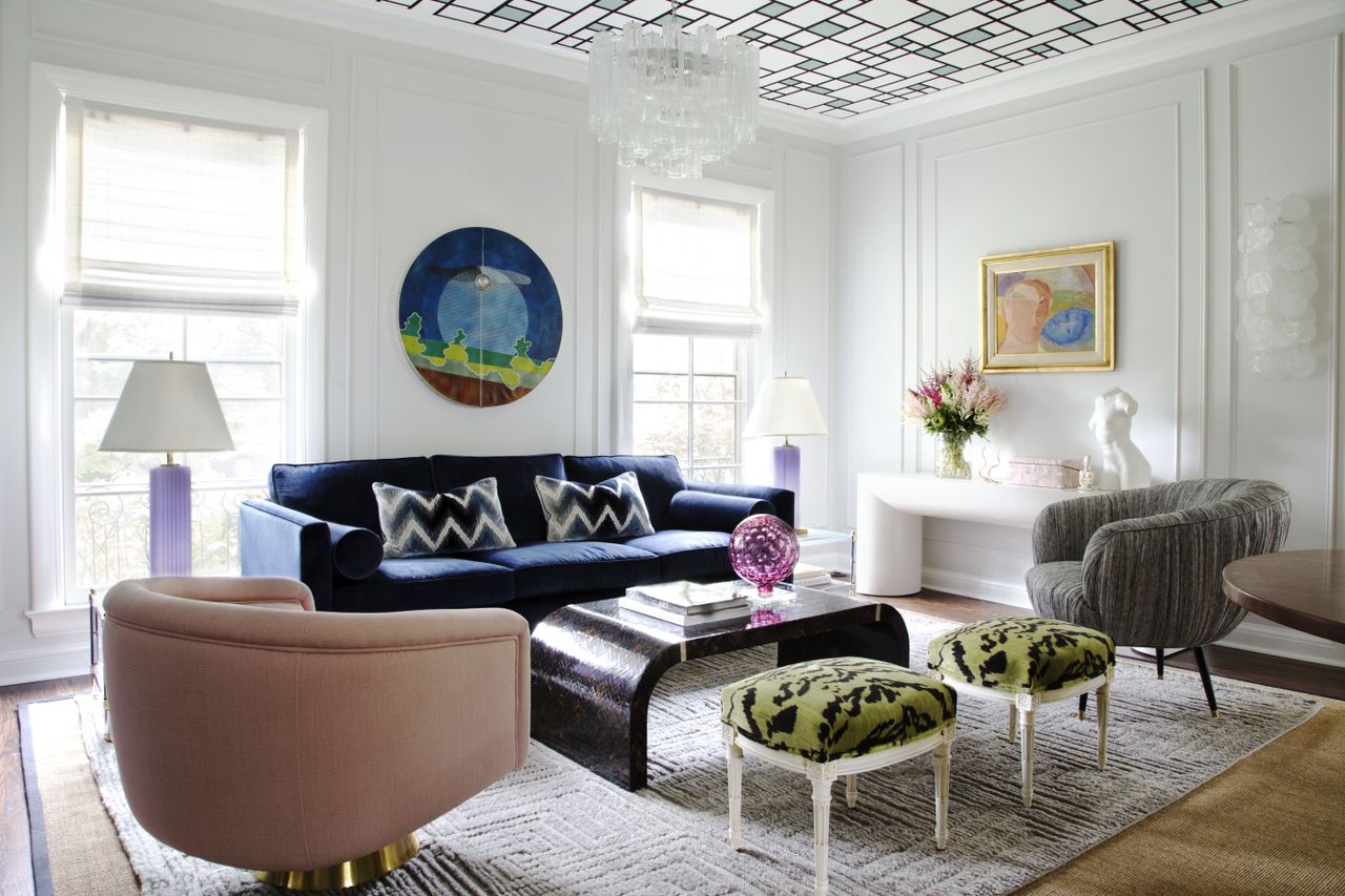 A living room with wallpaper on ceiling