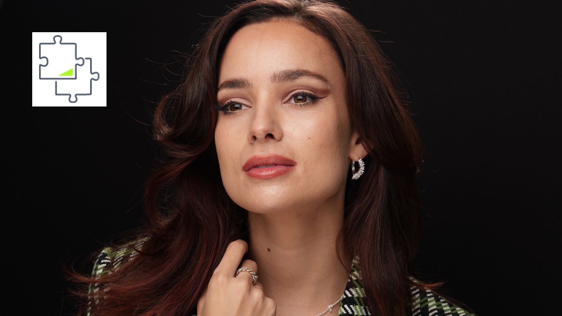 Portrait of a woman, with a jigsaw puzzle icon overlaid