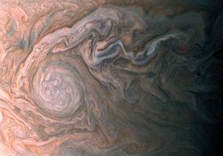 The swirling clouds on Jupiter, shown in an image captured by the JunoCam instrument on the Juno spacecraft, and processed by citizen scientist Roman Tkachenko.
