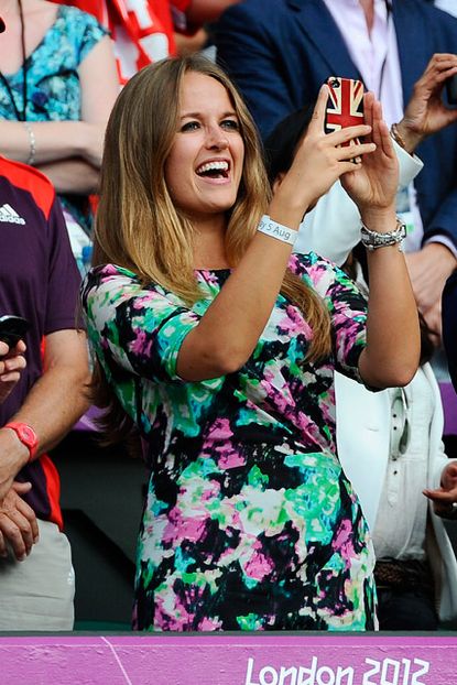 Kim Sears cheers Andy Murray on as he wins an Olympic gold medal in the tennis