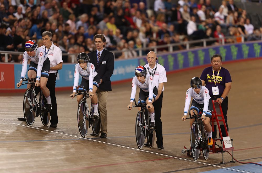 Katie Archibald, Eleanor Dickinson, Neah Evans and Laura Kenny of Great Britain acknowledge the crowd during the victory ceremony before winning the gold medal in the Womens Team Pursuit Finals