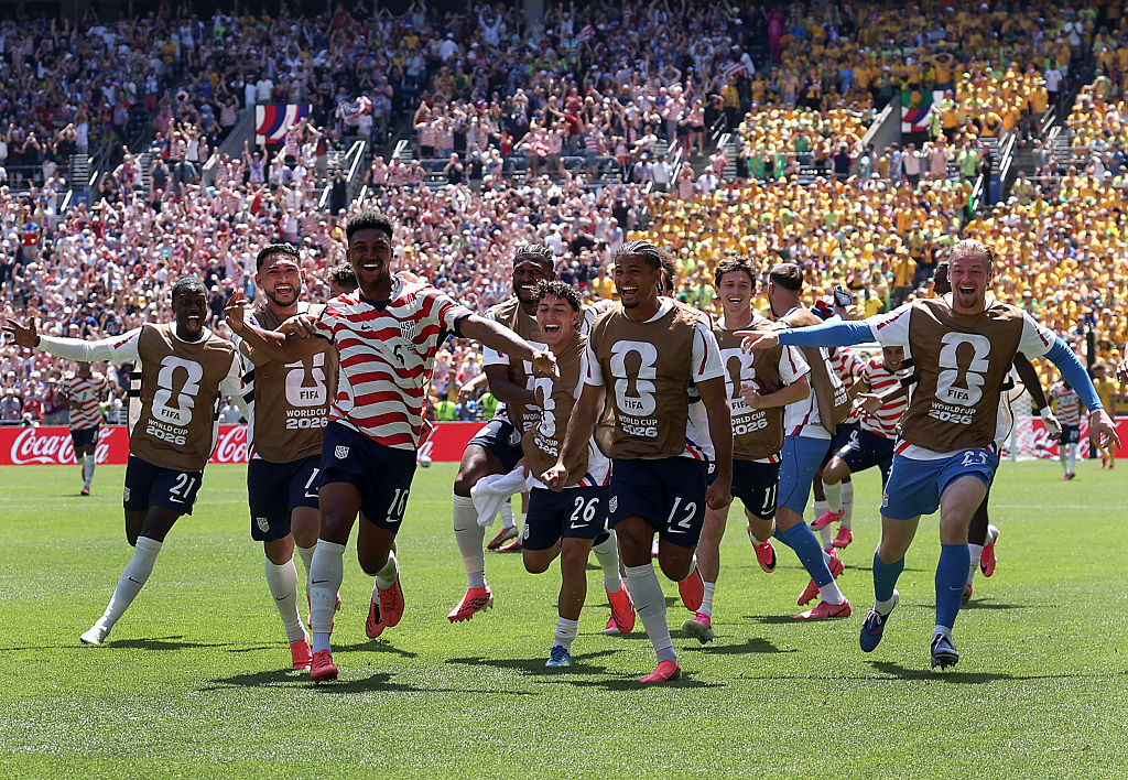 SEATTLE, WASHINGTON - JUNE 19: Alex Freeman #16 of the United States celebrates with teammates after scoring his team&amp;apos;s second goal during the FIFA World Cup 2026 Group D match between USA and Australia at Seattle Stadium on June 19, 2026 in Seattle, Washington. (Photo by Jamie Squire/Getty Images)
