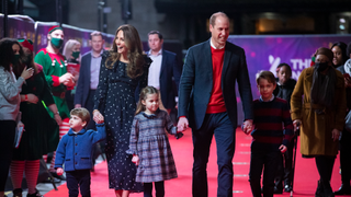 Prince William, Duke of Cambridge and Catherine, Duchess of Cambridge with their children, Prince Louis, Princess Charlotte and Prince George, attend a special pantomime performance at London's Palladium Theatre, hosted by The National Lottery, to thank key workers and their families for their efforts throughout the pandemic on December 11, 2020 in London, England