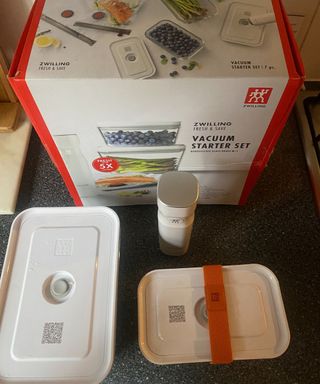 Zwilling Fresh and Save kit with box, two containers and vacuum machine in shot