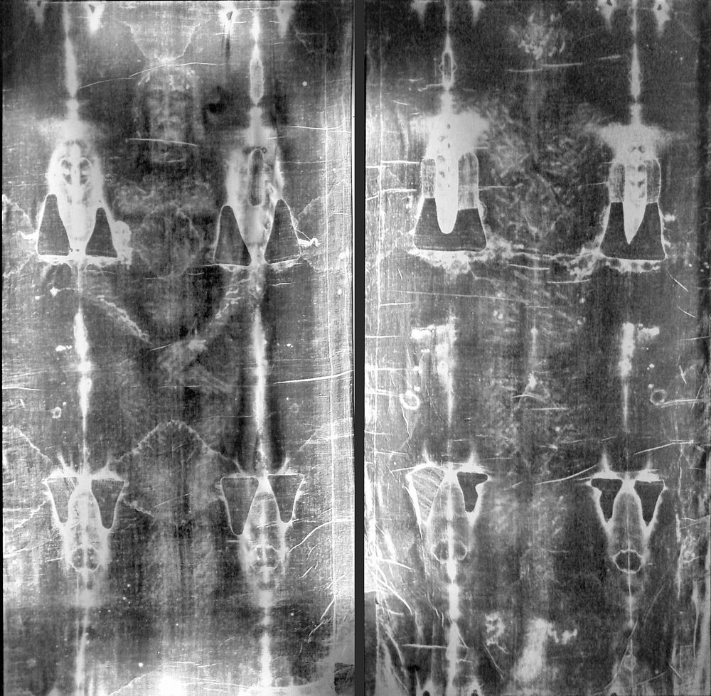 Full-length negative photograph of the Shroud of Turin. 