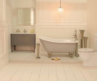 neutral bathroom with grey freestanding bath