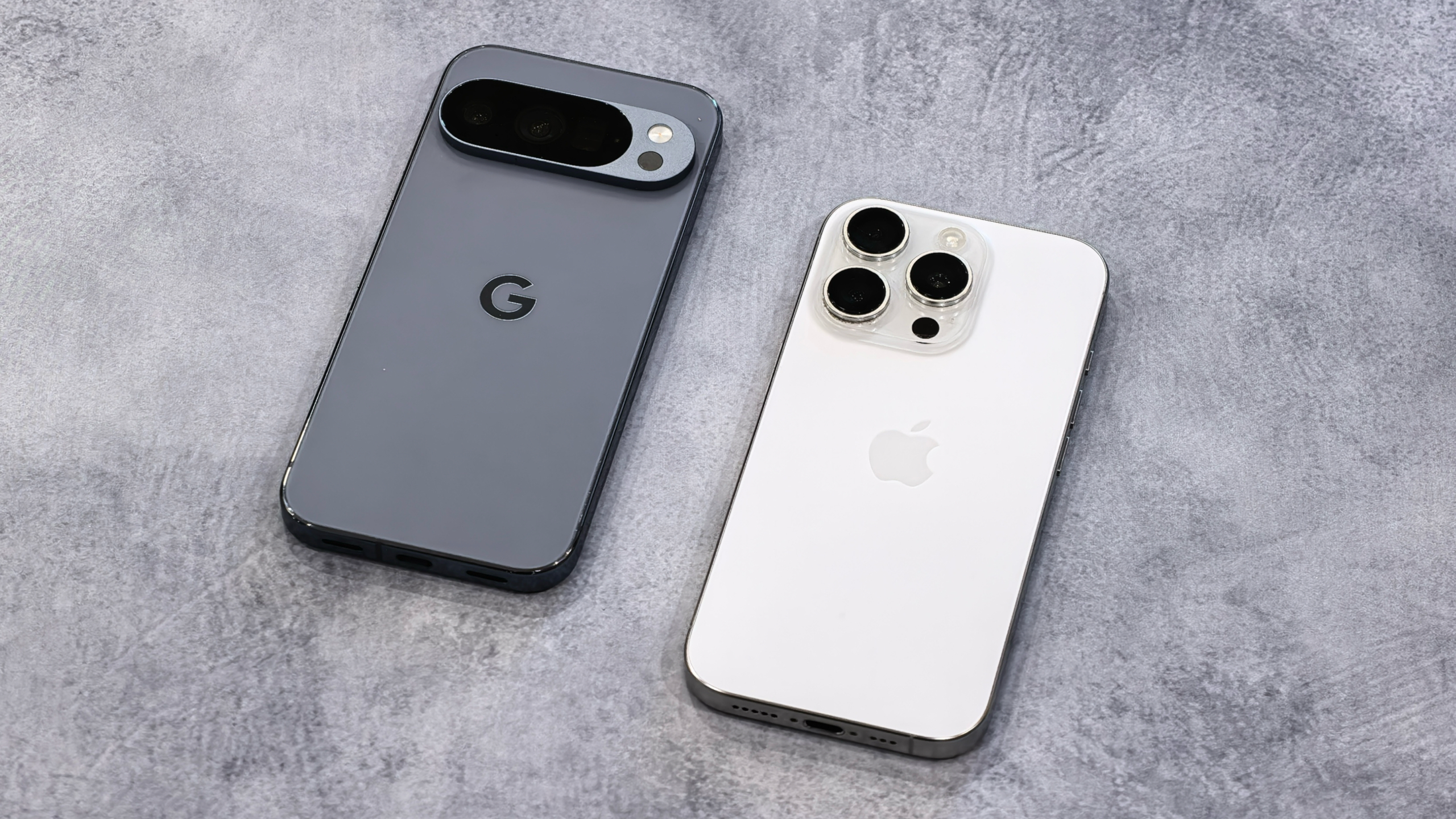 Google Pixel 10 Pro and iPhone 16 Pro on a table