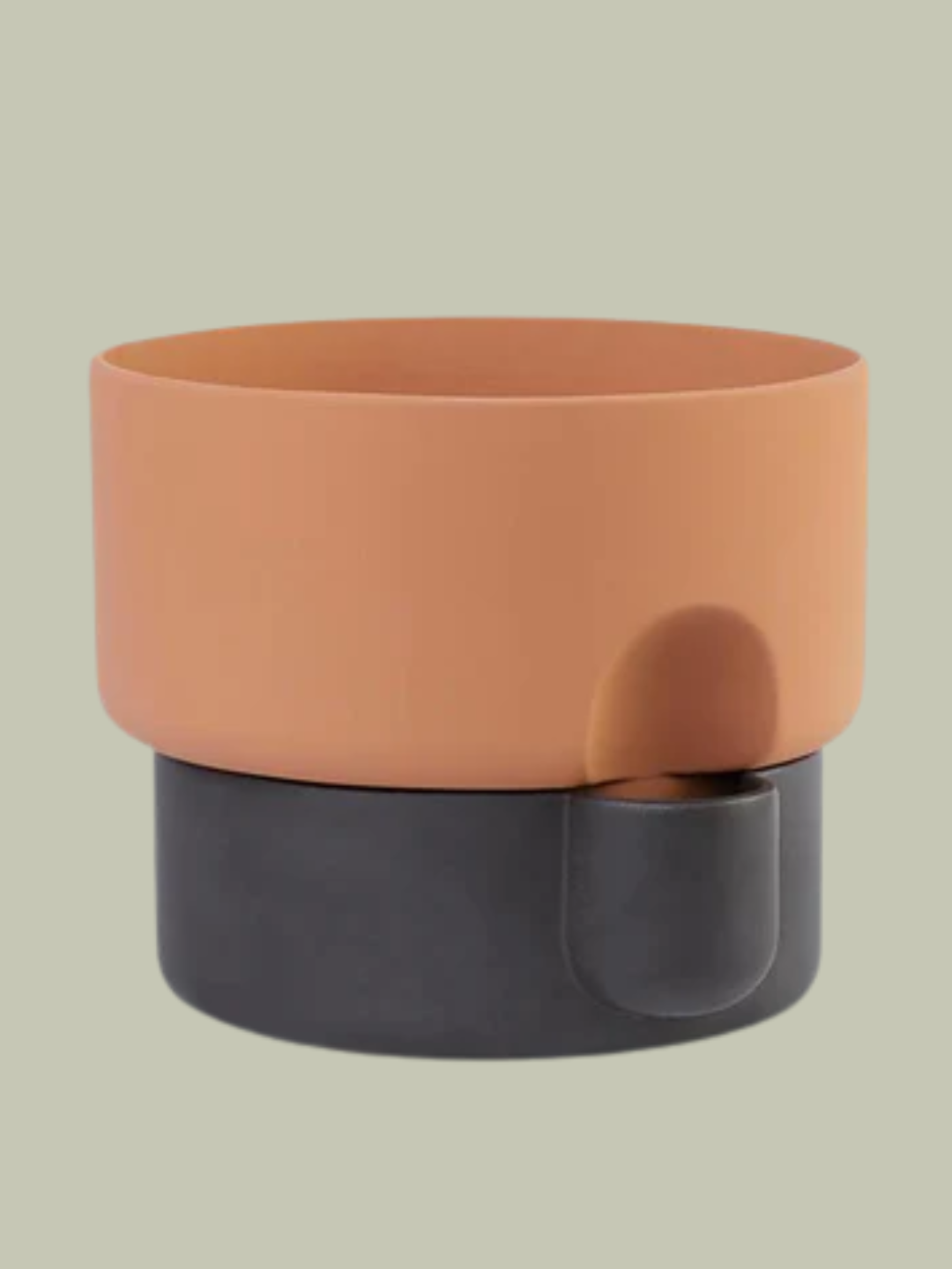A self-watering planter in terracotta and brown from Northern