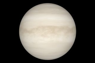 A view of Venus with visible light reveals a smooth, white sphere. The light cannot penetrate the planet's thick cloud layer.