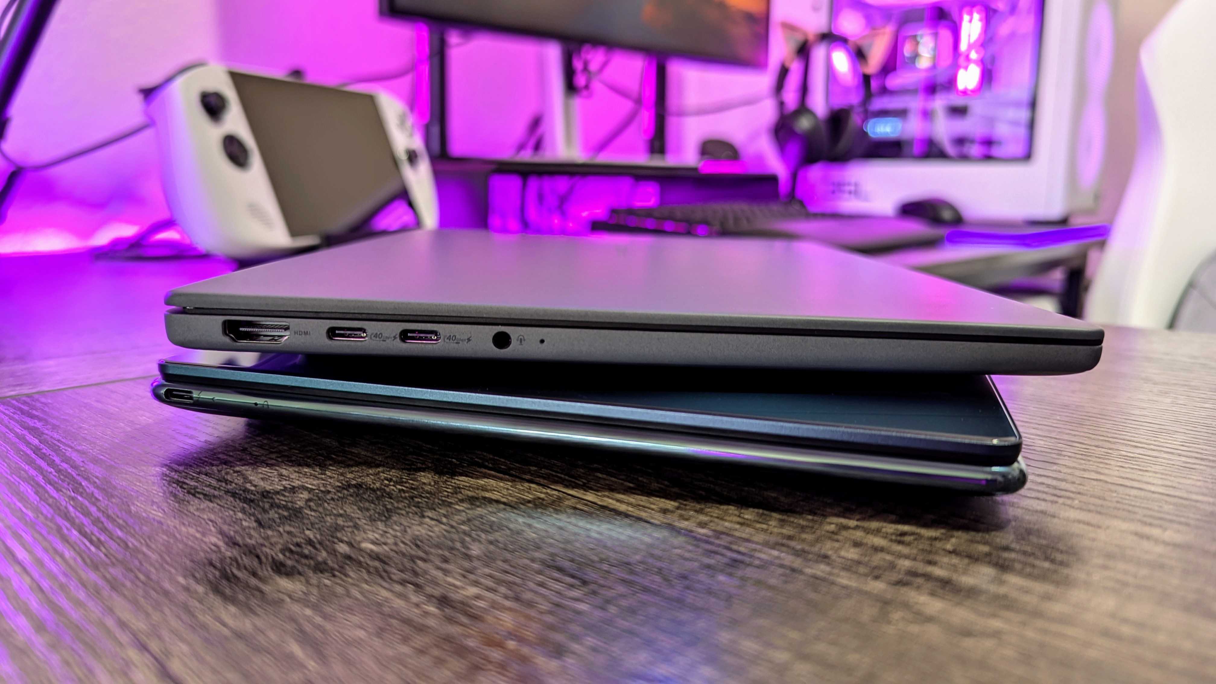 Image of the Lenovo Yoga Slim 9i 14 (Gen 10) and ASUS Zenbook A14 (2025) laptops.