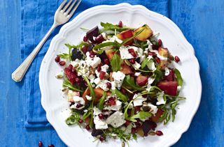 Roasted roots and feta salad with pomegranate and seeds
