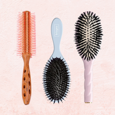 image of a collection of boar brushes on a pink background