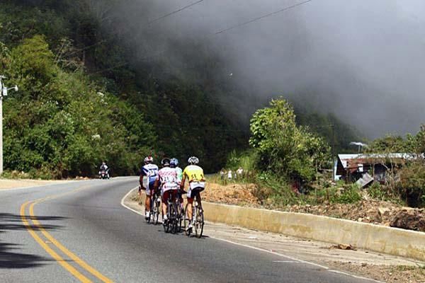 The riders head off into the fog.