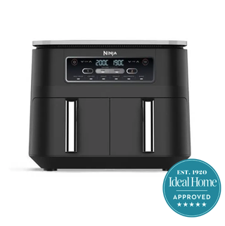 A grey two drawer Ninja air fryer with the Ideal Home approved 5 star badge 