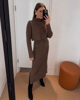 @streetchloe wearing a mocha-coloured knitted dress with black knee-high boots