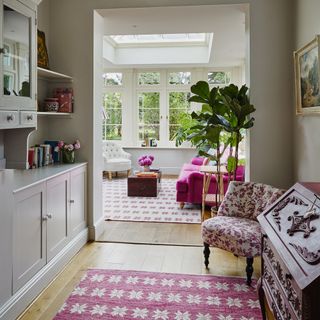 Open plan kitchen with wooden flooring