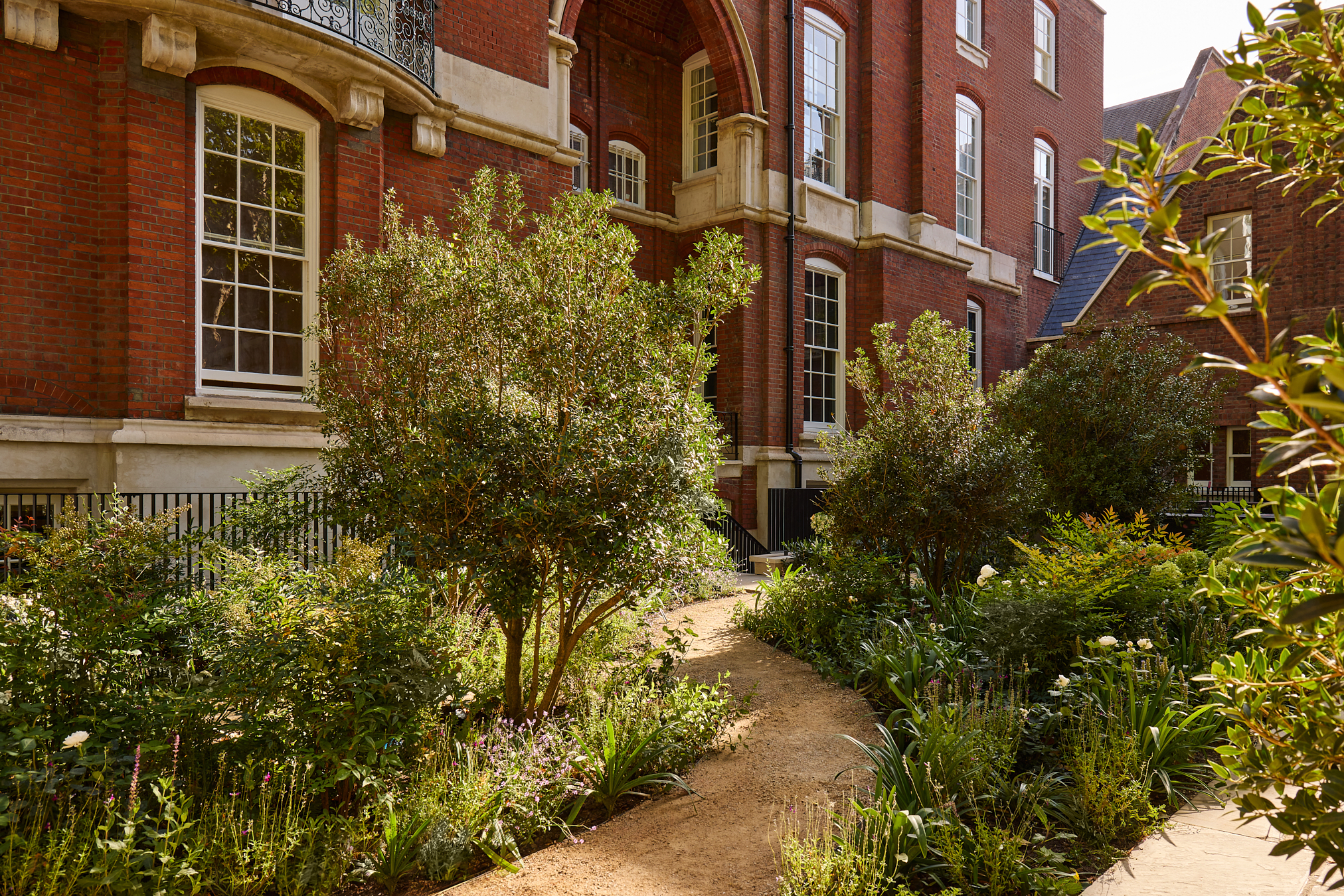 The communal gardens have been redesigned by landscape architect Randle Siddeley