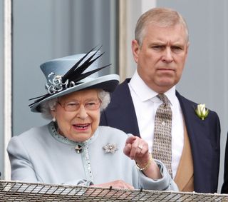 EPSOM, UNITED KINGDOM - JUNE 01: (EMBARGOED FOR PUBLICATION IN UK NEWSPAPERS UNTIL 48 HOURS AFTER CREATE DATE AND TIME) Queen Elizabeth II and Prince Andrew, Duke of York watch the racing as they attend Derby Day of the Investec Derby Festival at Epsom Racecourse on June 1, 2013 in Epsom, England. (Photo by Max Mumby/Indigo/Getty Images)