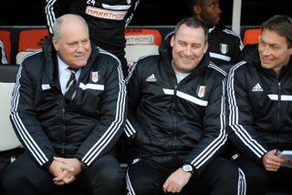 Rene Meulensteen, centre, and Martin Jol, left, in the Fulham dugout