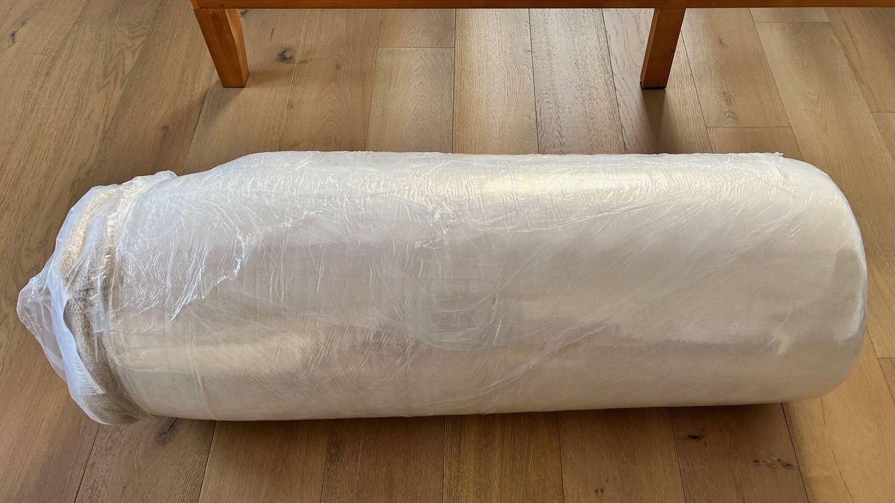 Birch Natural mattress rolled and wrapped in plastic