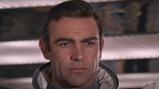 Sean Connery looking stoic while wearing a space suit in You Only Live Twice.