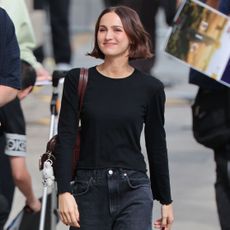 Maude Apatow wears jeans and a T-shirt