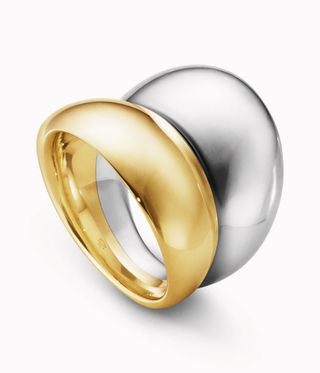 Georg Jensen’s Rings features two back to back curve rings one in gold and one in silver colour.