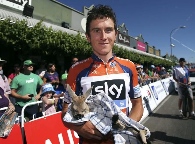 Race leader Geraint Thomas with a joey