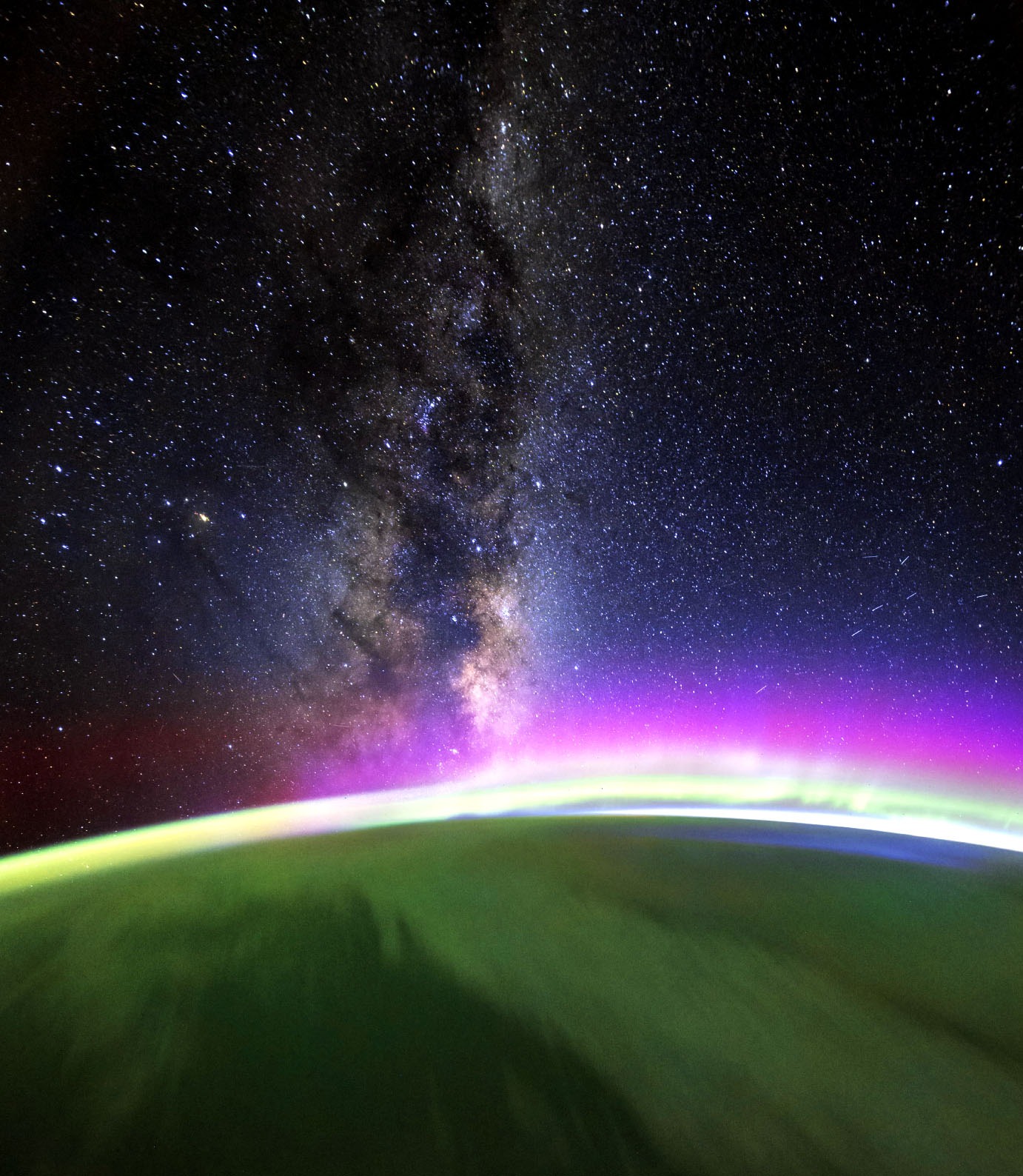 Am image of the Northern Lights and the Milky Way over the Earth taken from the ISS
