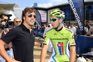 Fernando Alonso and Peter Sagan before stage two of the 2014 Dubai Tour