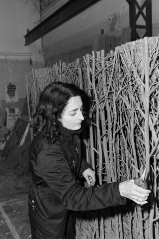 Eva Jospin Jospin at work on one of her bas-relief forest panels