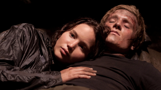 Jennifer Lawrence and Josh Hutcherson as Katniss and Peeta in the cave in The Hunger Games