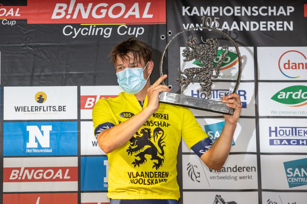 Belgian Jasper Philipsen of AlpecinFenix celebrates on the podium after winning the 105th edition of the Kamioenschap van Vlaanderen one day cycling race 1953 km from Koolskamp to Koolskamp Friday 17 September 2021 the eighth stage out of 9 of the Bingoal cycling cup BELGA PHOTO KURT DESPLENTER Photo by KURT DESPLENTERBELGA MAGAFP via Getty Images