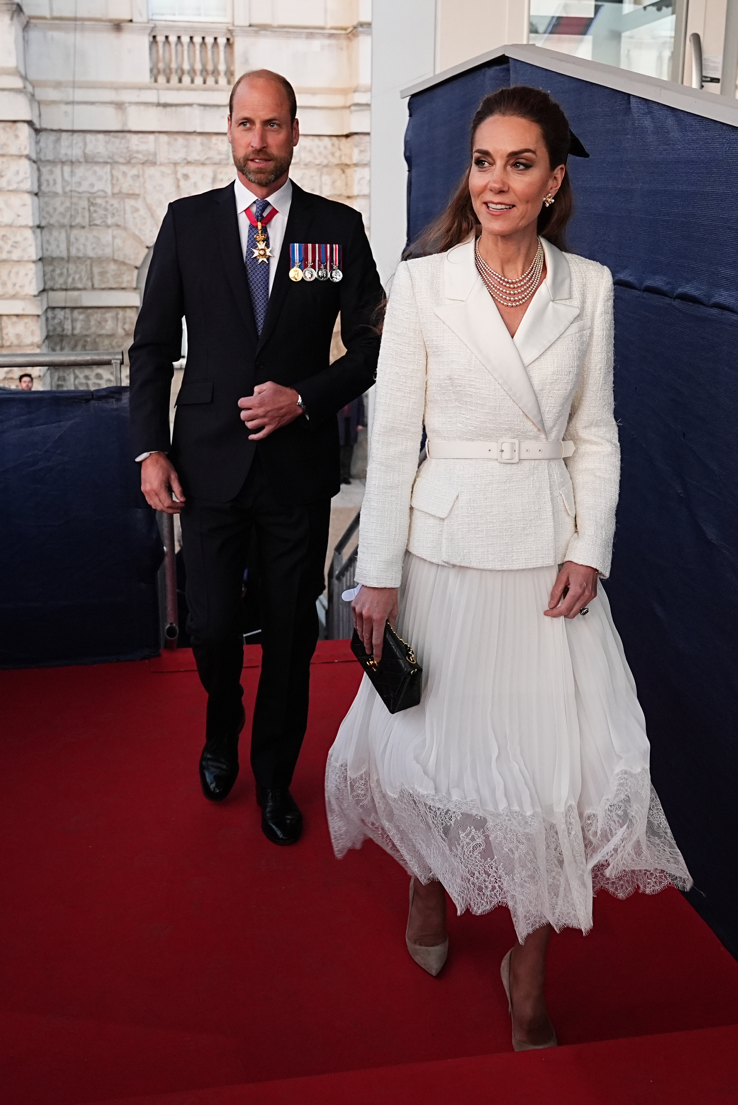 William, Prince of Wales and Catherine, Princess of Wales arrive to attend a concert celebrating the 80th Anniversary of VE Day, held at the historic Horse Guards Parade on May 8, 2025 in London, England.